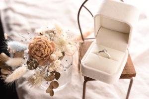 wedding ring and flowers